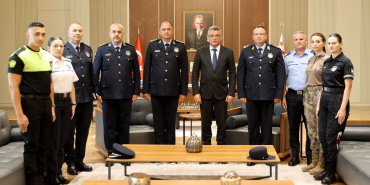 erhurman-polis.jpg