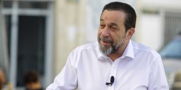 1786968496176tam-parti-serdar-denktas.jpg